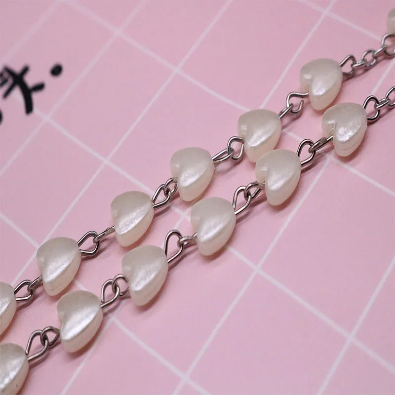 Heart pearl cross necklace